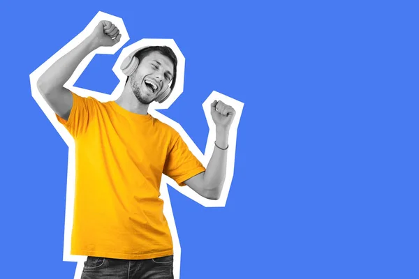 Happy Millennial Guy Yellow Shirt Using Brand New Wireless Stereo — Stockfoto