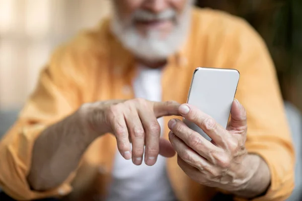 Cropped Senior Man Sitting Couch Home Using Modern Smartphone Checking — Stok fotoğraf