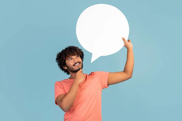 Pensive Attractive Millennial Indian Man Showing Blank Speech Bubble Touching — Stock fotografie