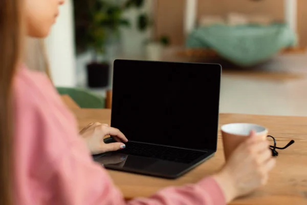 Schoolgirl Using Laptop Blank Screen Learning Doing Homework Typing Keyboard — Foto Stock