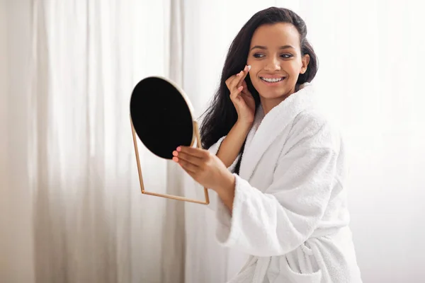 Facial Skincare Cosmetics Happy Woman Applying Moisturizer Cream Holding Mirror — Foto de Stock