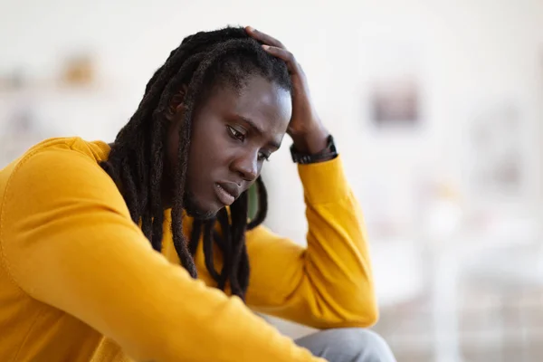 Closeup Portrait Depressed African American Guy Sitting Home Upset Pensive — Foto de Stock