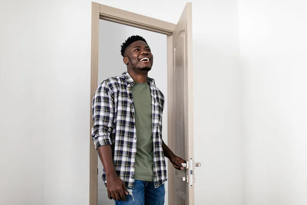 Joyful African American Male Opening Entry Door Entering His New — 스톡 사진