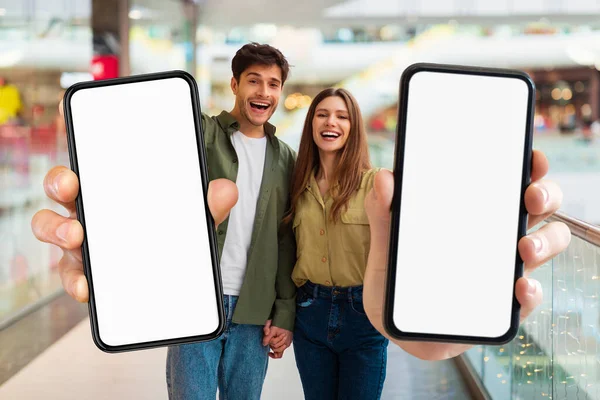 Discount App Happy Millennial Couple Standing Department Store Showing Big — Fotografia de Stock