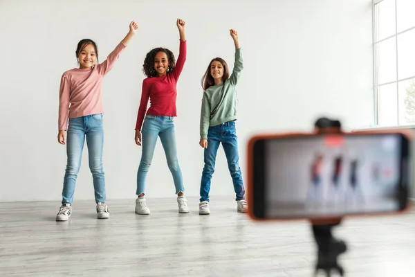 Three Diverse Blogger Girls Making Video Blog Smartphone Raising Arms — Fotografia de Stock
