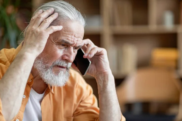 Unhappy Senior Man Having Phone Conversation Someone Touching His Head — Stok fotoğraf