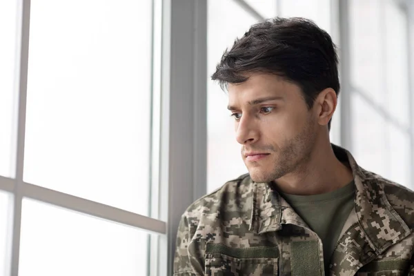Serious Short Haired Young Man Military Uniform Soldier Looking Window — Fotografia de Stock