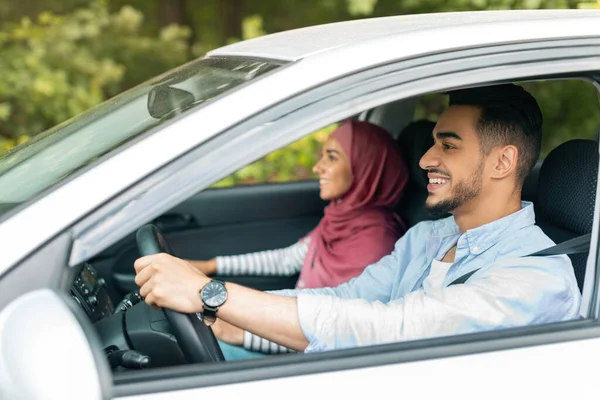 Happy Millennial Muslim Wife Hijab Husband Driving Car Steering Wheel — 스톡 사진