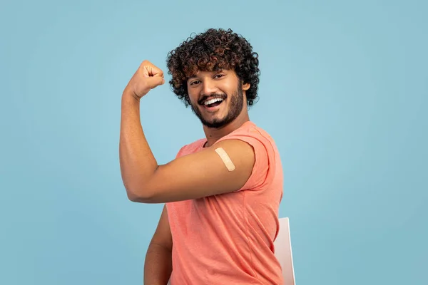Handsome Young Indian Man Pink Shirt Showing Biceps Adhesive Medical — Φωτογραφία Αρχείου