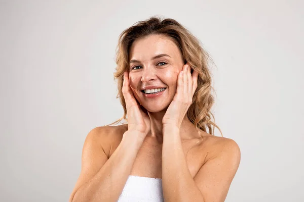 Antiage Skincare Happy Attractive Middle Aged Female Touching Face Smiling — Stok fotoğraf