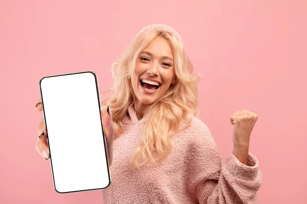 Excited Young Woman Holding Smartphone Blank Screen Gesturing Yes Overjoyed — Stock Fotó