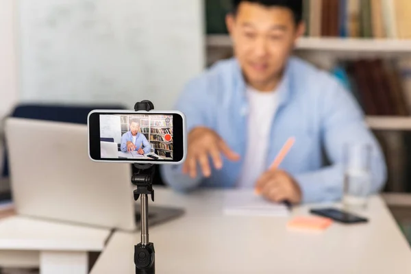 Educational Blogging Asian Tutor Man Filming Online Lecture Smartphone Sitting — ストック写真