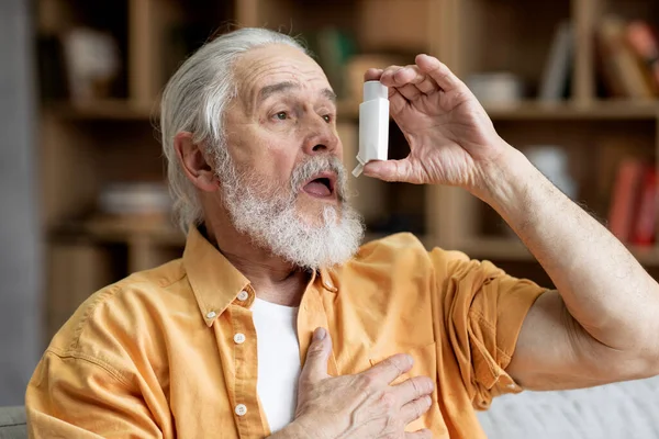 Sick Bearded Grey Haired Senior Man Touching His Chest Using — Stockfoto