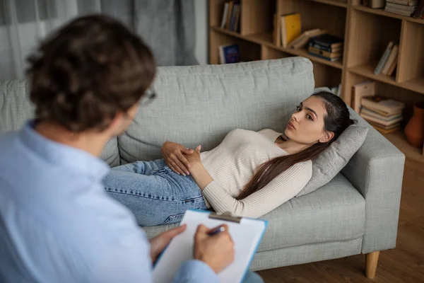 Sad Millennial European Woman Suffering Mental Problems Lies Couch Talk — Stockfoto