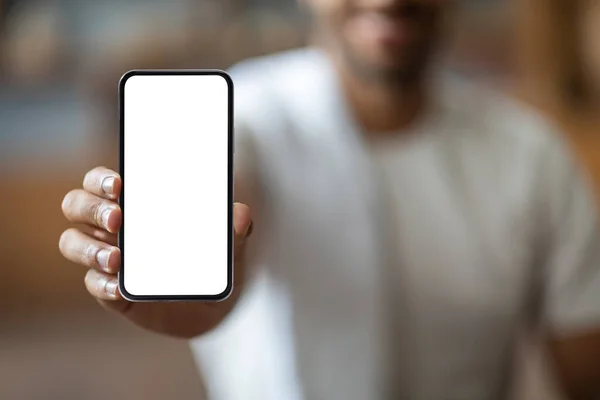 Unrecognizable Black Guy Demonstrating Modern Smartphone Blank White Screen Camera — Stok Foto