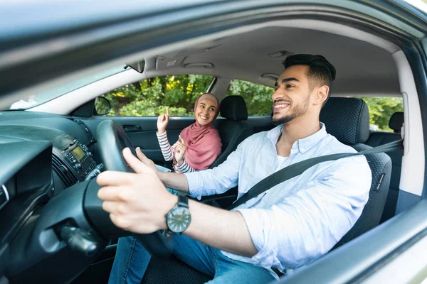 Cheerful Millennial Middle Eastern Guy Driving Car Lady Hijab Ride — Foto Stock