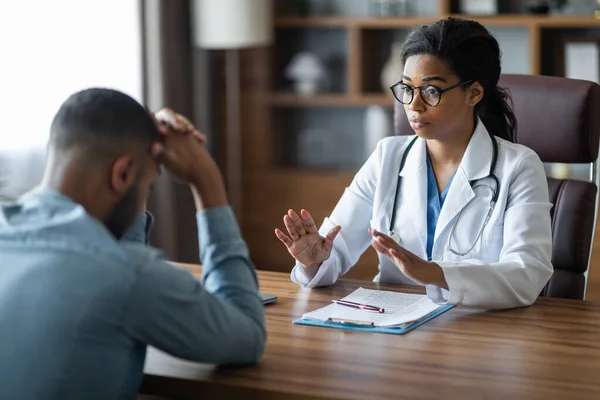 Black Woman Doctor Consoling Upset Crying Sick Man Patient Therapist — Foto de Stock