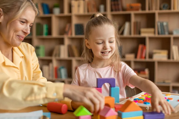 Friendly Child Development Specialist Observing Girl Preschooler Happy Little Child — Fotografie, imagine de stoc