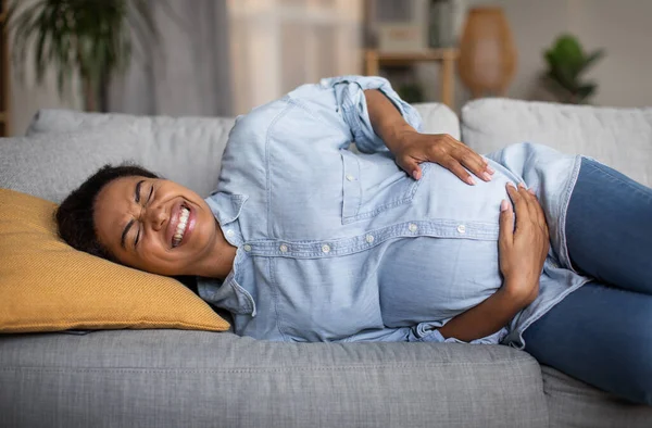 Pregnant African American Female Having Painful Contractions Spasm Touching Big — стоковое фото
