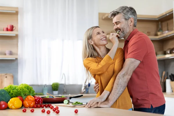 Happy Middle Aged Spouses Preparing Delicious Dinner Together Cheerful Attractive — Stockfoto