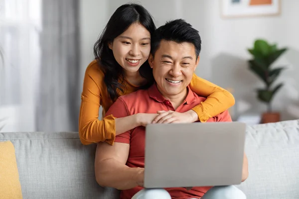 Happy Korean Couple Using Computer Together Home Cheerful Pretty Young — Stock Photo, Image