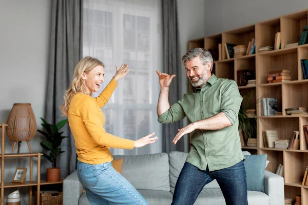 Domestic Fun Cheerful Middle Aged Spouses Dancing Living Room Interior — Stok fotoğraf