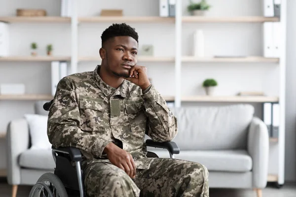 Depressed Young Black Man Sitting Wheelchair Wearing Military Uniform Touching — Stock Fotó