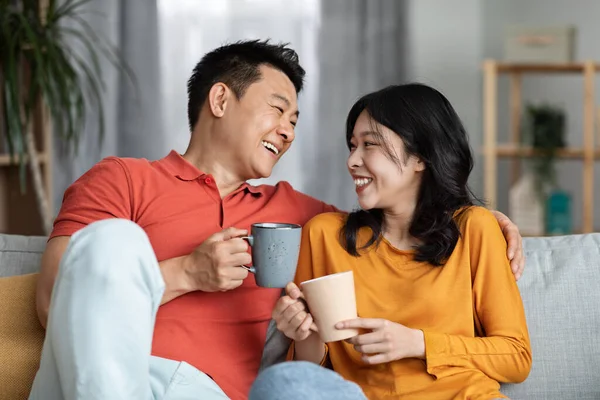 Portrait Positive Asian Lovers Happy Man Woman Casual Outfits Sitting — Stok fotoğraf