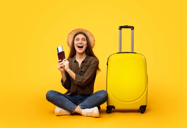 Travel Offer Excited Lady Tourist Holding Passport Tickets Sitting Suitcase — Stockfoto