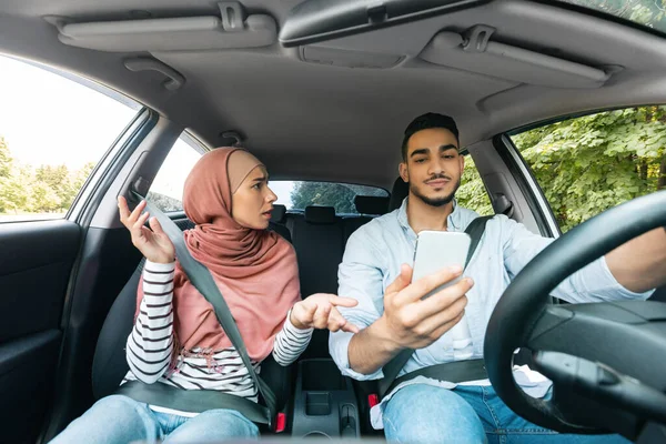 Disappointed Millennial Muslim Woman Hijab Swears Her Husband Smartphone While — Stockfoto