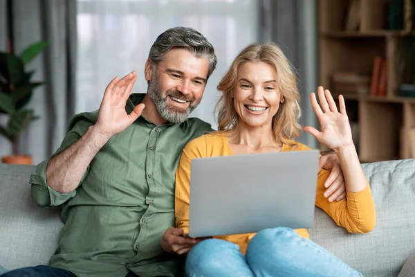 Happy Middle Aged Couple Making Video Call Laptop Home Cheerful — Stockfoto