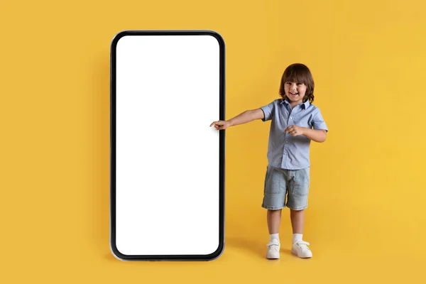 Educational Kids Mobile App Happy Positive Little Boy Pointing Aside — Stok fotoğraf