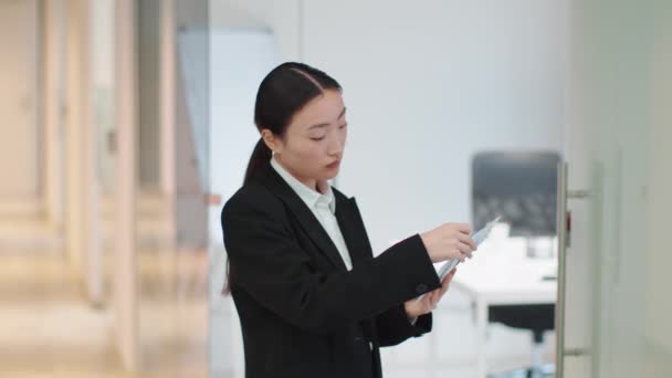 Corporate Renovation Professional Asian Woman Interior Designer Choosing Colors Swatch — стоковое видео