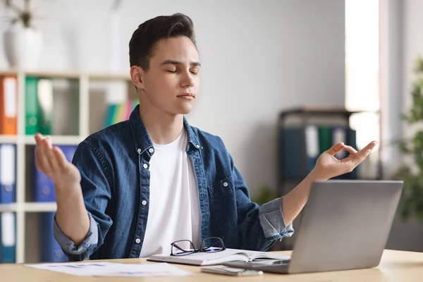 Portrait Young Male Office Employee Meditating Workplace Millennial Man Sitting — Stockfoto