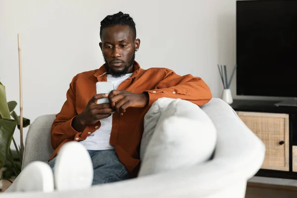 Cheerful African American Man Watching Video Smartphone Resting ...