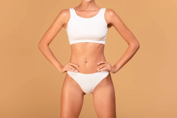 Young Slender Lady Hands Hips Posing White Underwear Beige Studio — Stock Photo, Image