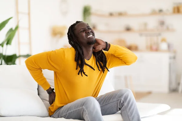 Portrait Stressed Young Black Man Suffering Neck Back Pain While — Stock Photo, Image