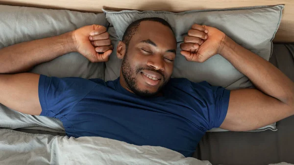 2012 Top View Black Man Sleeping Well Lying Eyes Closed — 스톡 사진