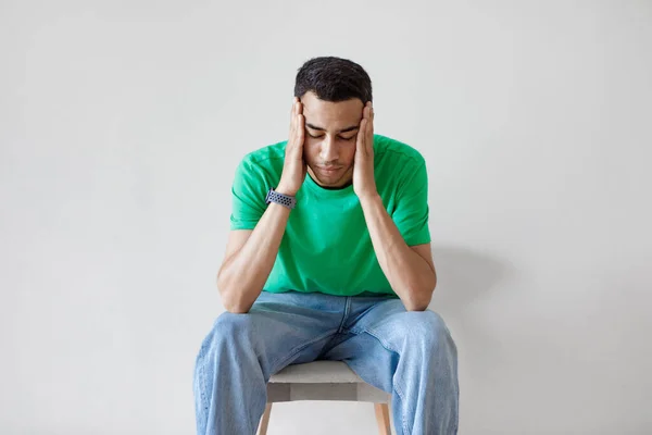 Concerned Arab Man Thinking Worrying Problems Touching Head While Sitting — Stock Photo, Image