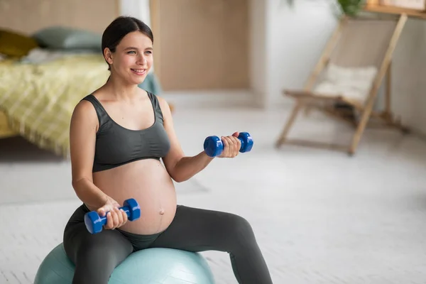 Beautiful Young Pregnant Woman Sitting Fitball Training Dumbbells Home Smiling — Stok Foto