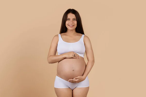 Portrait Happy Young Pregnant Woman Underwear Touching Belly Smiling While — Stok Foto