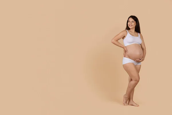 Beautiful Young Pregnant Woman Underwear Touching Belly Looking Aside Copy — Stok Foto