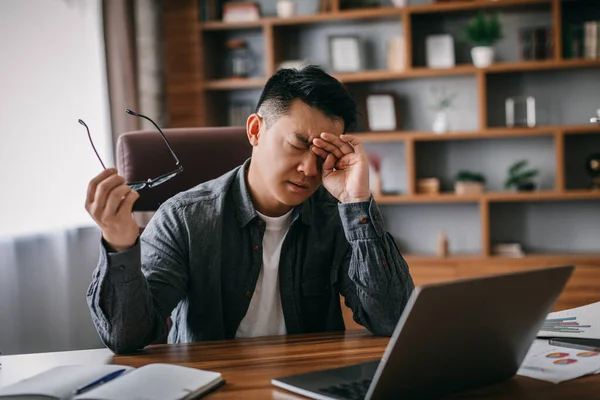 Sad Tired Adult Chinese Man Takes His Glasses Rubs Eyes — Foto de Stock