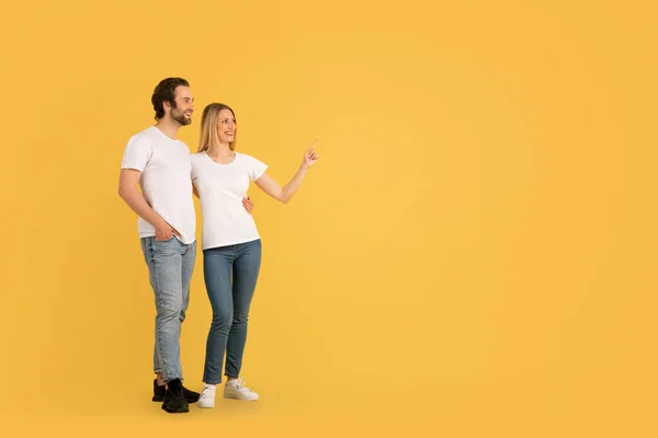 Cheerful Millennial Caucasian Lady Man White Shirts Hugging Pointing Finger — Stock Photo, Image