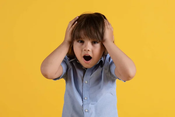 Cute Little Boy Having Some Troubles Touching His Head Shock — Stock Photo, Image