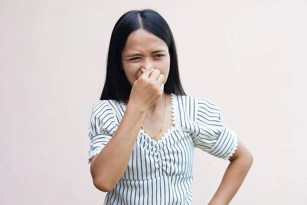 Asian Women Cover Noses Hands Because Smell Bad — Stock Fotó