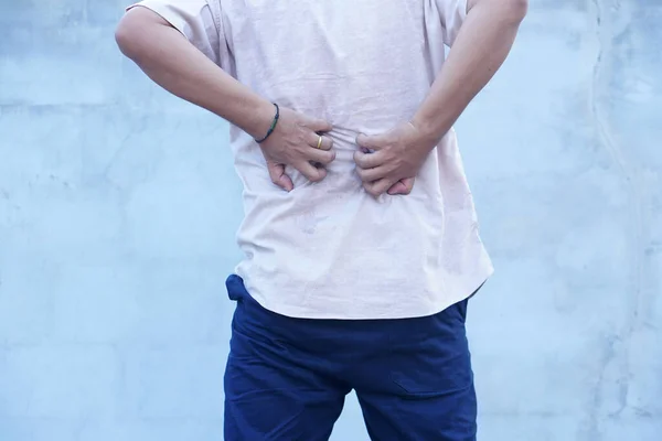Backside White Man Back Pain Ache Concept Itchy Asian Man — Zdjęcie stockowe