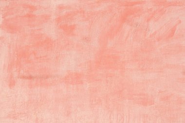 Soluk boyalı pembe demir bir duvarın dokusu. Eski metal lekeli duvar.