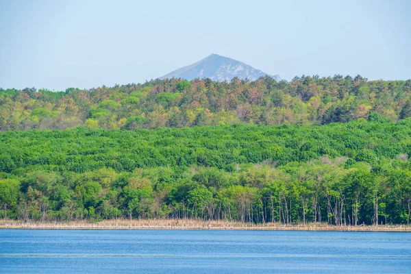Tambukan forest lake on the background of a green mountain in Pyatigorsk . The nature of Russia and the Caucasus.