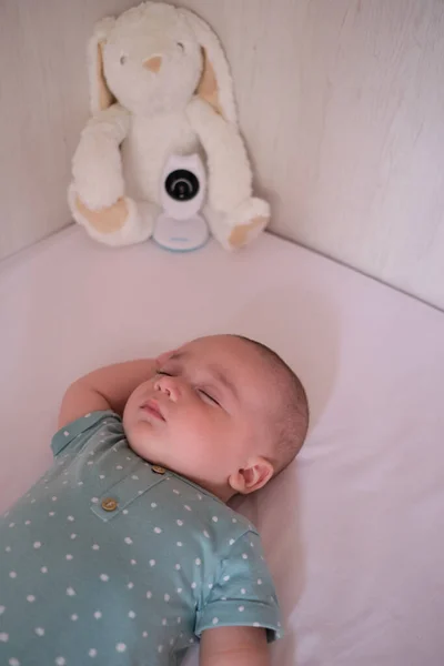 Baby Monitor Camera Watching Caucasian Baby While Sleeps Crib — Stock Photo, Image